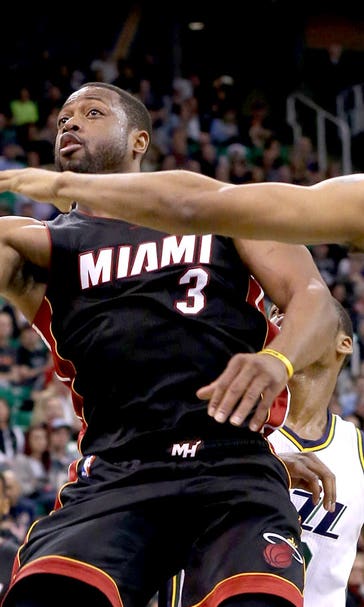 Wade fights off illness, scores 29 to lead Heat past Jazz